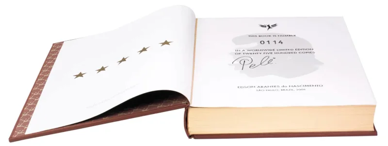 Autographed book by Pelé